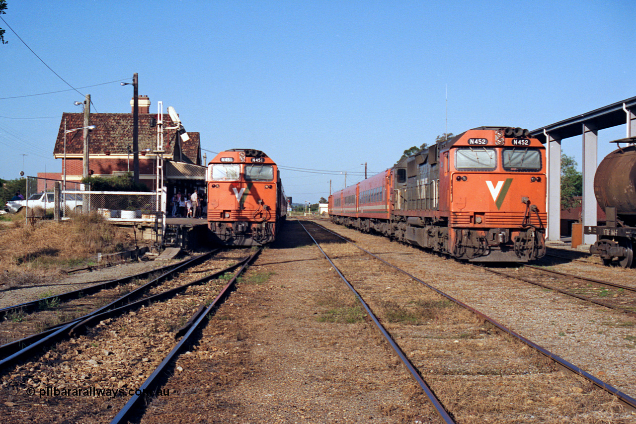 123-1-13
Bairnsdale station overview, V/Line broad gauge N class locos N 451 'City of Portland' Clyde Engineering EMD model JT22HC-2 serial 85-1219 with an up passenger train and N class N 452 'Rural City of Wodonga' serial 85-1220 with a stabled pass in the yard, signal post.
Keywords: N-class;N451;Clyde-Engineering-Somerton-Victoria;EMD;JT22HC-2;85-1219;