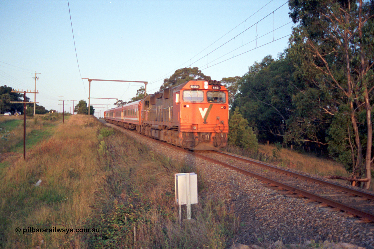 123-1-22
Traralgon, Coonoc Rd, V/Line broad gauge N class N 451 'City of Portland' Clyde Engineering EMD model JT22HC-2 serial 85-1219, N set, up Bairnsdale pass.
Keywords: N-class;N451;Clyde-Engineering-Somerton-Victoria;EMD;JT22HC-2;85-1219;