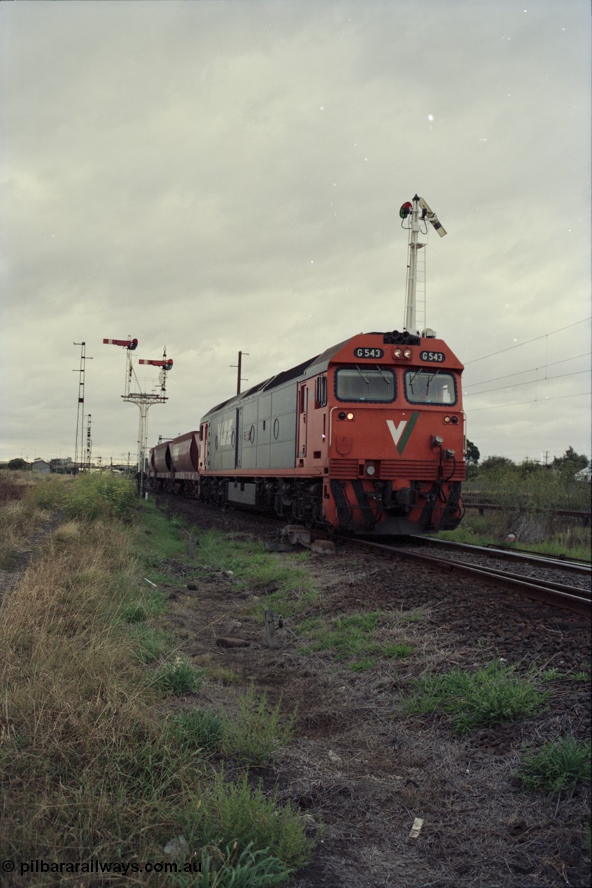 123-2-22
Sunshine track view, Newport - Sunshine Loop Line, looking towards Sunshine, double doll semaphore signal posts 36 and pulled off semaphore signal post 49 sort of frame V/Line broad gauge G class G 543, the last member of the class, Clyde Engineering EMD model JT26C-2SS serial 89-1276 with loaded up Apex quarry train bound for Brooklyn.
Keywords: G-class;G543;Clyde-Engineering-Somerton-Victoria;EMD;JT26C-2SS;89-1276;