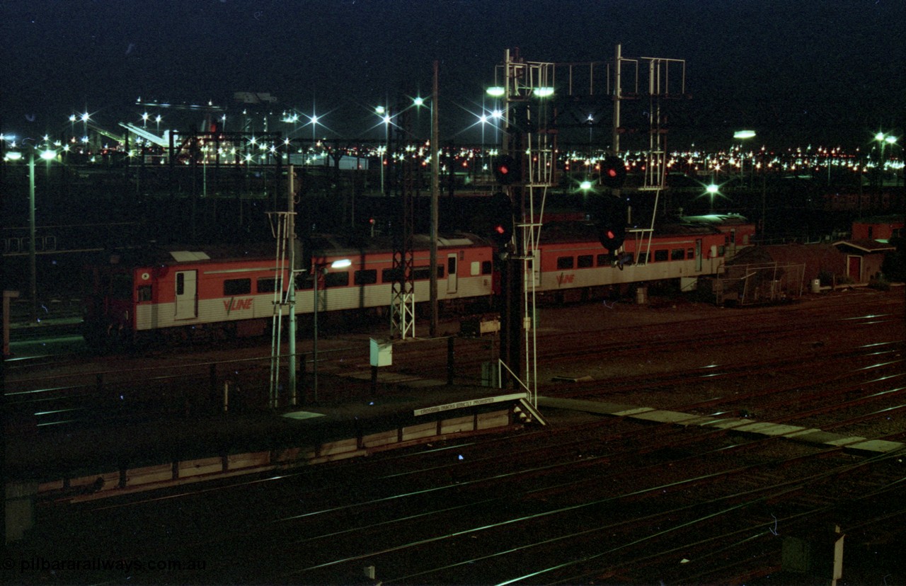 123-2-32
Spencer Street Station yard view, night shot, rail motor storage tracks, 3 broad gauge V/Line DRC class units.
Keywords: DRC-class;Tulloch-Ltd-NSW;