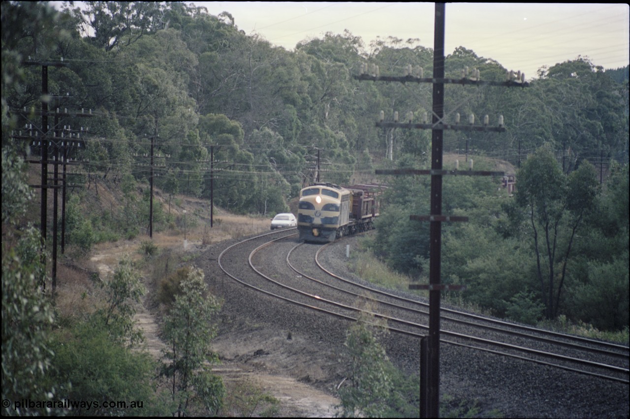 125-11
Kilmore East V/Line broad gauge B class 65 Clyde Engineering EMD model ML2 serial ML2-6 still in Victorian Railways livery leads a sleeper discharge train on the up broad gauge line.
Keywords: B-class;B65;Clyde-Engineering-Granville-NSW;EMD;ML2;ML2-6;bulldog;