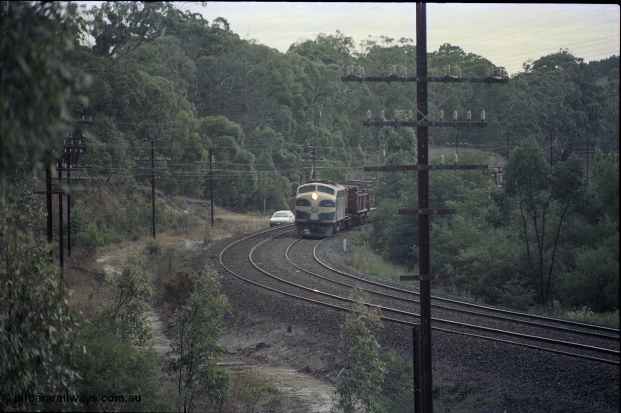 125-12
Kilmore East V/Line broad gauge B class 65 Clyde Engineering EMD model ML2 serial ML2-6 still in Victorian Railways livery leads a sleeper discharge train on the up broad gauge line.
Keywords: B-class;B65;Clyde-Engineering-Granville-NSW;EMD;ML2;ML2-6;bulldog;