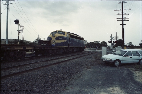 125-25
Wallan, Wallan-Wandong Rd crossing, BV/Line broad gauge B class Clyde Engineering EMD model ML2 serial ML2-6 still in Victorian Railways livery leads a sleeper discharge train on the up broad gauge line, trailing shot.
Keywords: B-class;B65;Clyde-Engineering-Granville-NSW;EMD;ML2;ML2-6;bulldog;