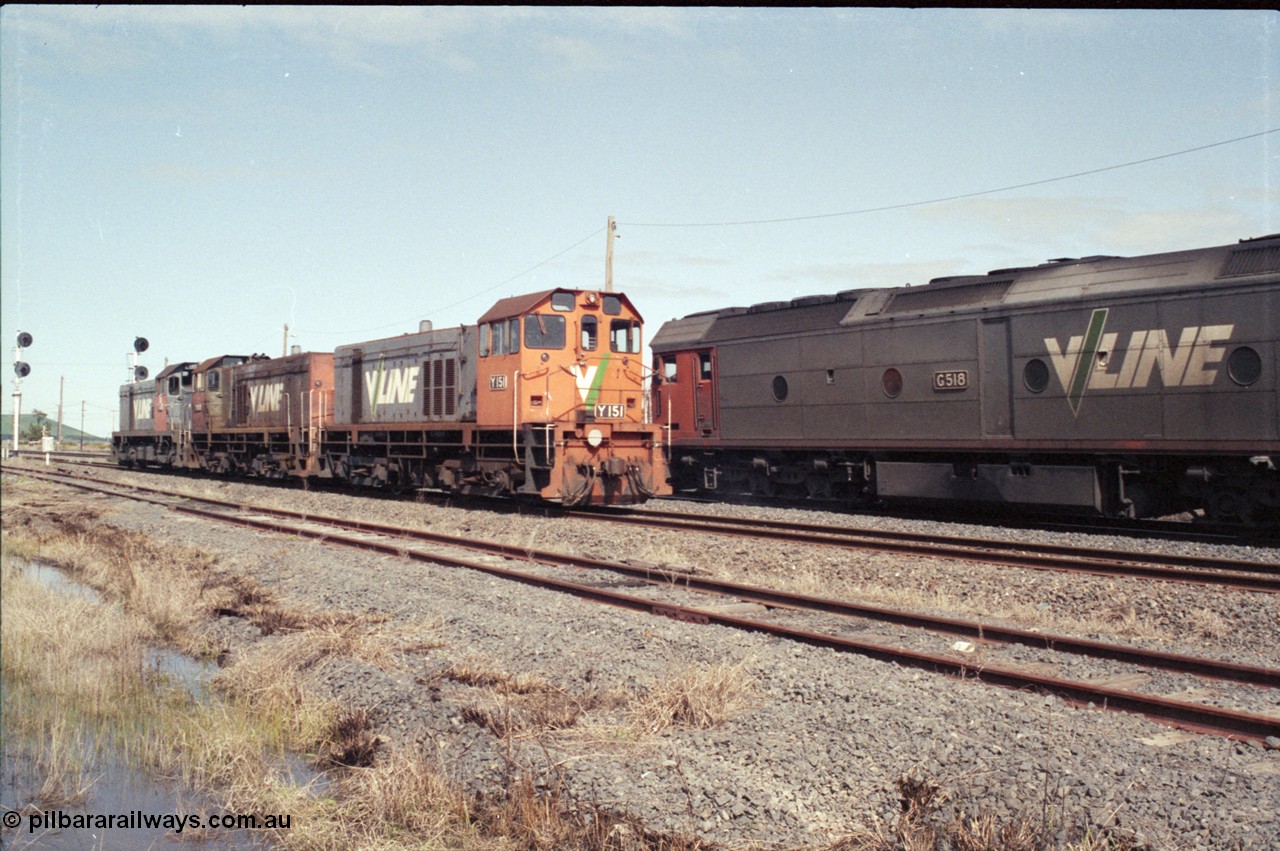 126-26
Wallan Loop, standard gauge V/Line G class G 518 Clyde Engineering EMD model JT26C-2SS serial 85-1231, up Melbourne Express passenger train, crossing rescue locos in loop at Wallan, V/Line Clyde Engineering EMD G8B model Y classes Y 151 serial 67-571 and Y 102 serial 63-292 and G18B T class T 411 serial 68-627.
Keywords: G-class;G518;Clyde-Engineering-Rosewater-SA;EMD;JT26C-2SS;85-1231;