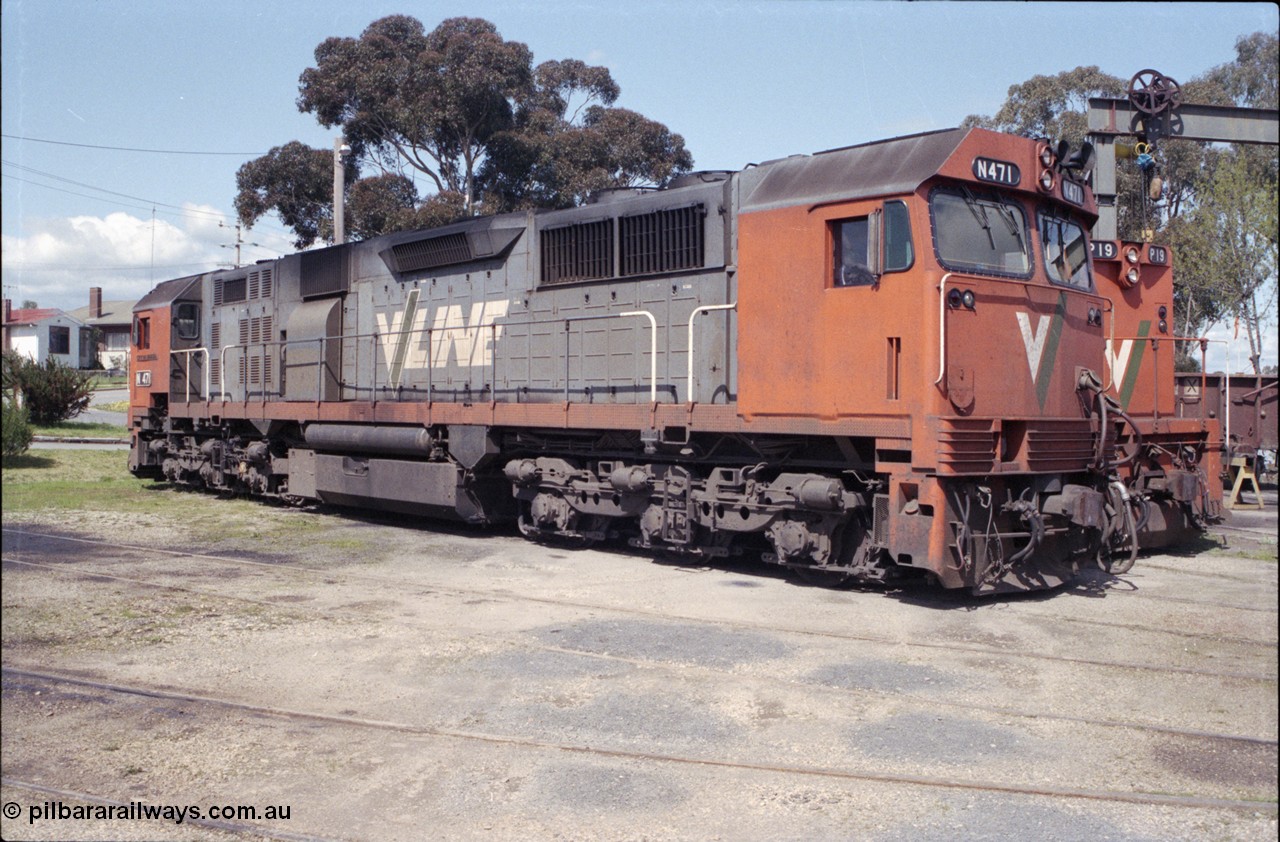 126-37
Seymour loco depot turntable roads, 3/4 view of V/Line broad gauge N class N 471 'City of Benalla' Clyde Engineering EMD model JT22HC-2 serial 87-1200.
Keywords: N-class;N471;Clyde-Engineering-Somerton-Victoria;EMD;JT22HC-2;87-1200;