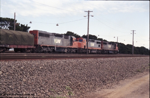 126-15
Tottenham broad gauge train 9169 down goods to Adelaide via Cressy, brake testing at Tottenham , V/Line C classes C 503 Clyde Engineering EMD model GT26C serial 76-826, C 506 serial 76-829 and C 501 'George Brown' serial 76-824, trailing view.
Keywords: C-class;C501;Clyde-Engineering-Rosewater-SA;EMD;GT26C;76-824;C506;76-826;C503;76-829;
