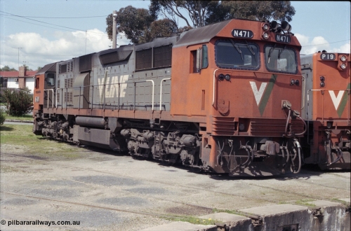 126-36
Seymour loco depot turntable roads, 3/4 view of V/Line broad gauge N class N 471 'City of Benalla' Clyde Engineering EMD model JT22HC-2 serial 87-1200.
Keywords: N-class;N471;Clyde-Engineering-Somerton-Victoria;EMD;JT22HC-2;87-1200;