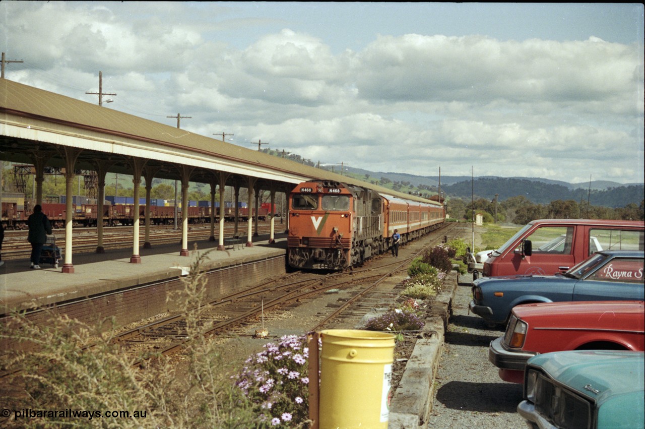 127-07
Albury, broad gauge passenger platform, V/Line N class N 468 'City of Bairnsdale' Clyde Engineering EMD model JT22HC-2 serial 86-1197, double N set, loco being cut off, crew on ground, slab steel waggons in background.
Keywords: N-class;N468;Clyde-Engineering-Somerton-Victoria;EMD;JT22HC-2;86-1197;