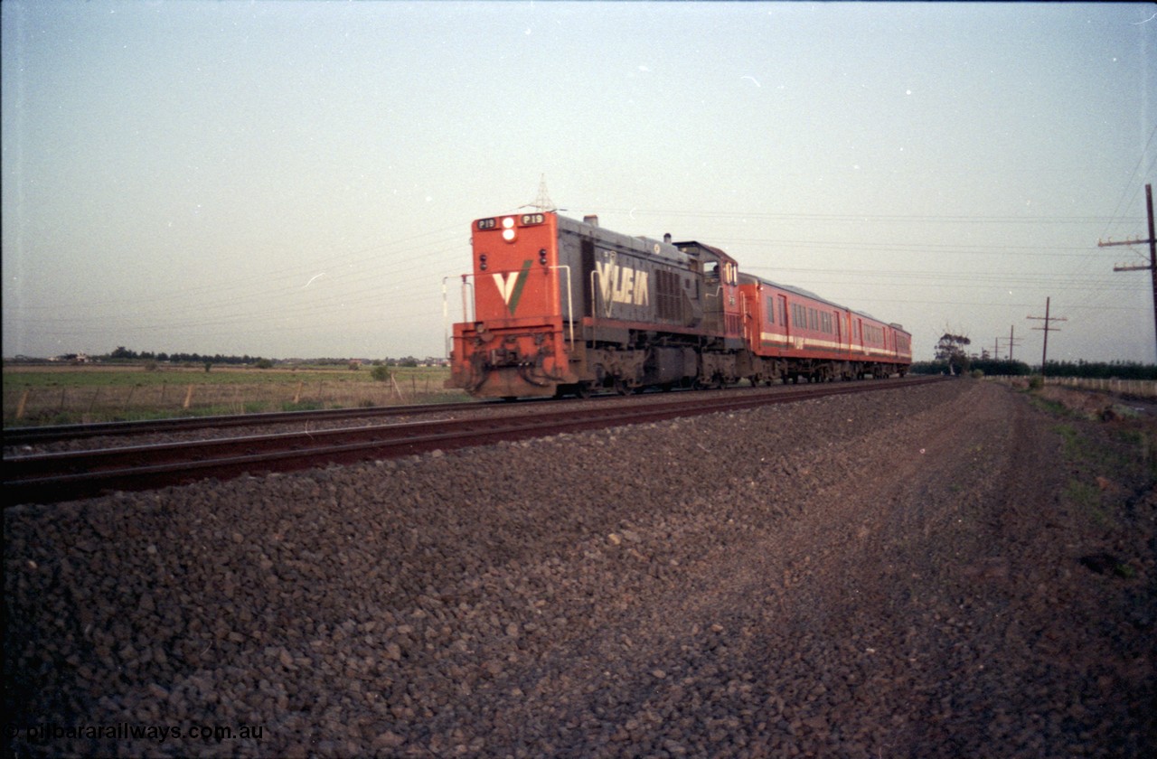127-15
Deer Park West, V/Line broad gauge P class P 19 Clyde Engineering EMD model G18HBR serial 84-1212 rebuilt from T 331 Clyde Engineering EMD model G8B serial 56-98 with H set, down early evening Bacchus Marsh passenger service, note mismatched panel doors on hood of loco.
Keywords: P-class;P19;Clyde-Engineering-Somerton-Victoria;EMD;G18HBR;84-1212;rebuild;