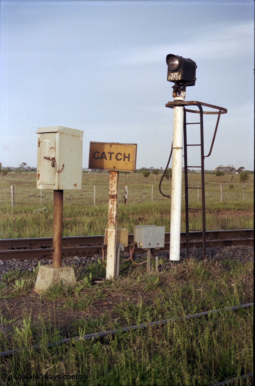 127-20
Deer Park West, signal post 2/10, telephone cabinet and 'CATCH' sign at the Boral quarry junction on the main western line.
