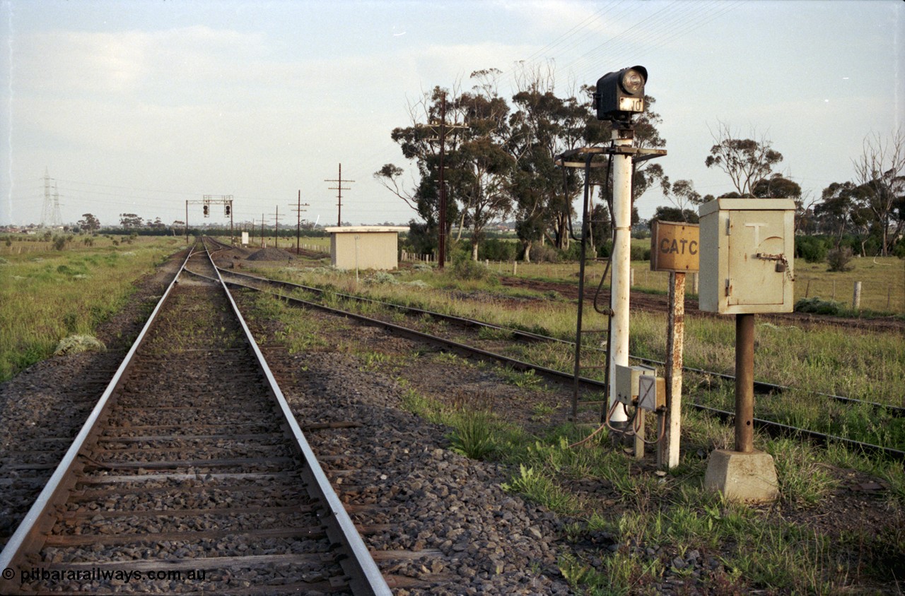 127-21
Deer Park West, view looking to Melbourne at the start of the double track broad gauge, with the line to Boral Quarries on the right. This was a common ballast loading location in Melbourne for V/Line.
