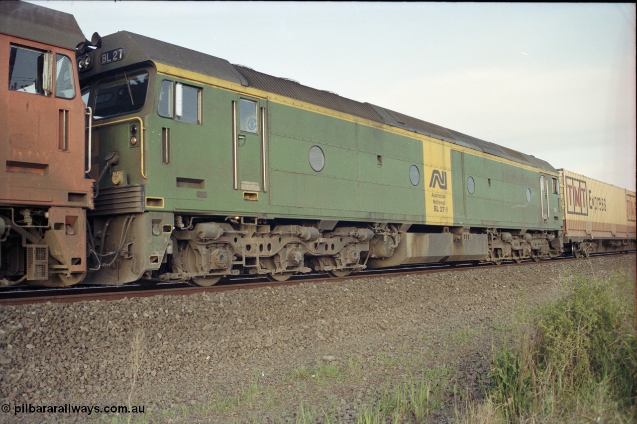 127-25
Deer Park West, broad gauge Australian National BL class BL 27 Clyde Engineering EMD model JT26C-2SS serial 83-1011, trailing unit on a down Adelaide goods train.
Keywords: BL-class;BL27;Clyde-Engineering-Rosewater-SA;EMD;JT26C-2SS;83-1011;