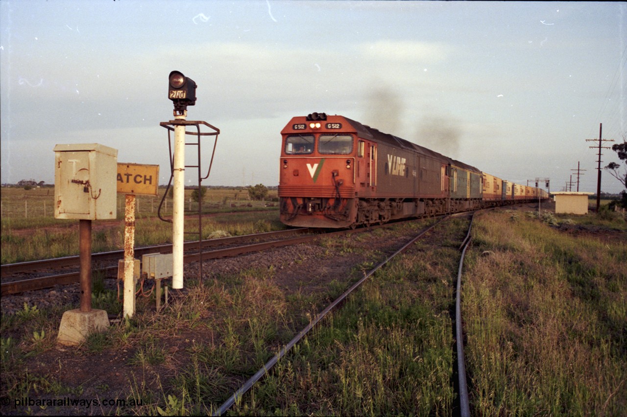 127-27
Deer Park West, broad gauge V/Line G class G 512 Clyde Engineering EMD model JT26C-2SS serial 84-1240 leads Australian National BL class BL 27 Clyde Engineering EMD model JT26C-2SS serial 83-1011 with a down Adelaide bound goods as they power away past the Boral junction on the main western line, train view, catch points
Keywords: G-class;G512;Clyde-Engineering-Rosewater-SA;EMD;JT26C-2SS;84-1240;