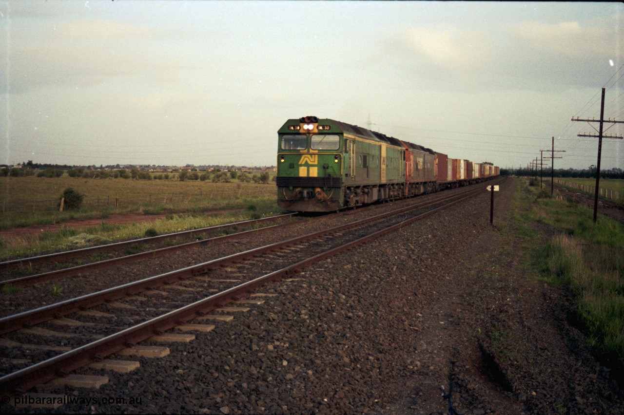 127-29
Deer Park West, broad gauge Australian National BL class BL 33 Clyde Engineering EMD model JT26C-2SS serial 83-1017 leads a V/Line G class with another down Adelaide bound goods train, this time on the north line.
Keywords: BL-class;BL33;Clyde-Engineering-Rosewater-SA;EMD;JT26C-2SS;83-1017;