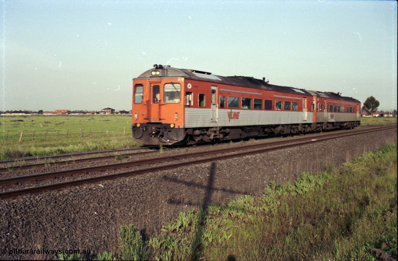 127-31
Deer Park West, V/Line broad gauge double Tulloch Ltd DRC class rail motors head a down Bacchus Marsh passenger service, I guess the skyline has changed since then?
Keywords: DRC-class;Tulloch-Ltd-NSW;