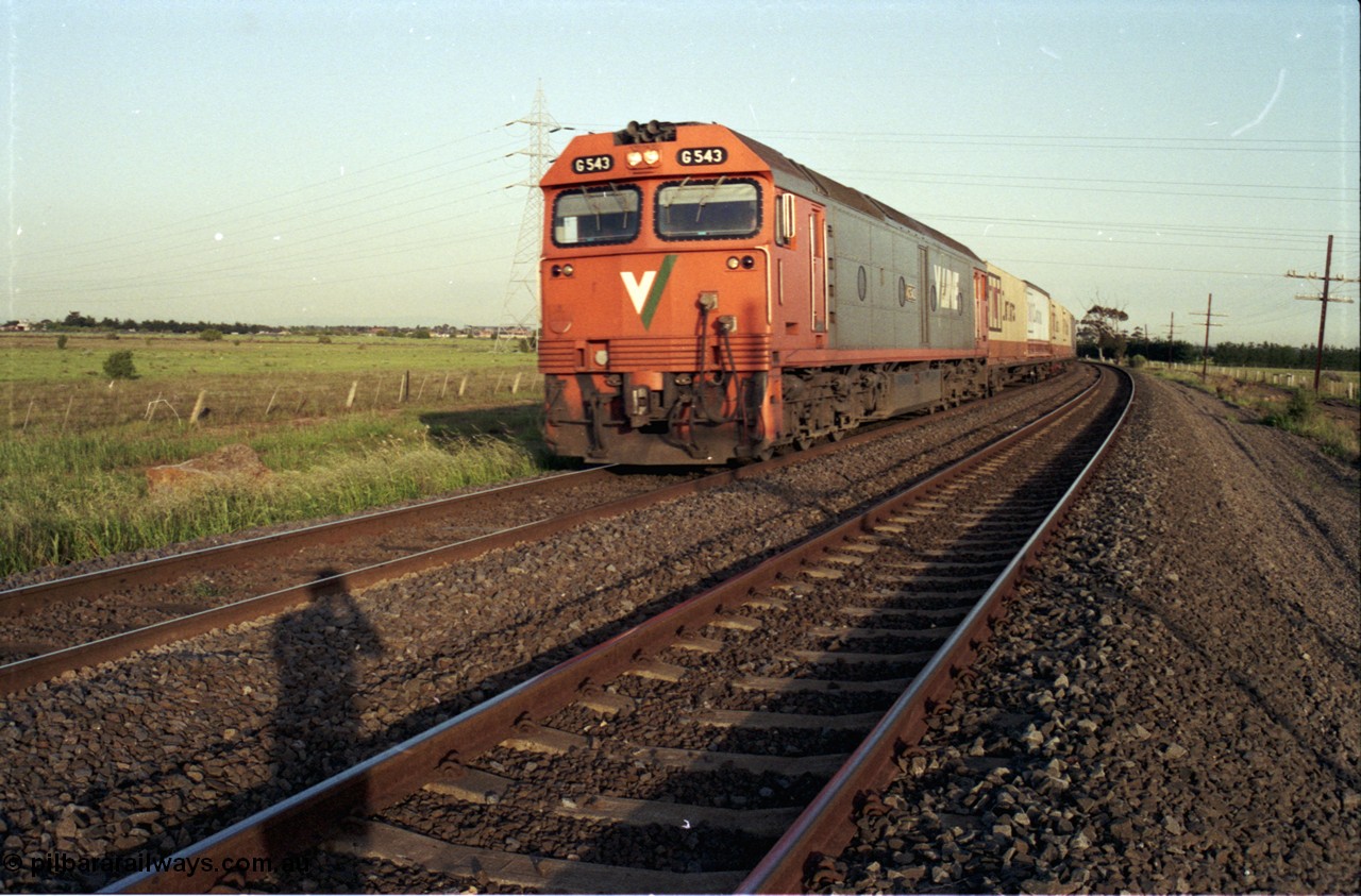 127-32
Deer Park West, broad gauge V/Line G class G 543 Clyde Engineering EMD model JT26C-2SS serial 89-1276 leads an Adelaide bound down goods train on the north line.
Keywords: G-class;G543;Clyde-Engineering-Somerton-Victoria;EMD;JT26C-2SS;89-1276;