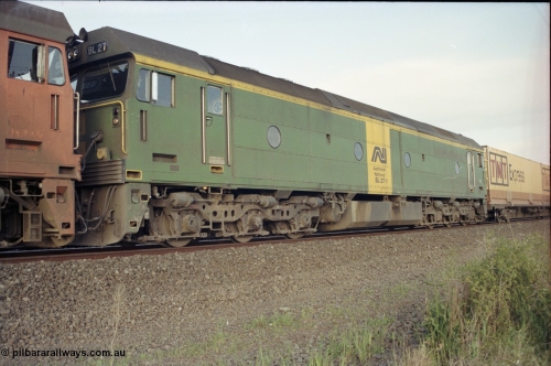 127-25
Deer Park West, broad gauge Australian National BL class BL 27 Clyde Engineering EMD model JT26C-2SS serial 83-1011, trailing unit on a down Adelaide goods train.
Keywords: BL-class;BL27;Clyde-Engineering-Rosewater-SA;EMD;JT26C-2SS;83-1011;