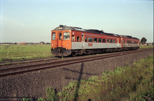127-31
Deer Park West, V/Line broad gauge double Tulloch Ltd DRC class rail motors head a down Bacchus Marsh passenger service, I guess the skyline has changed since then?
Keywords: DRC-class;Tulloch-Ltd-NSW;