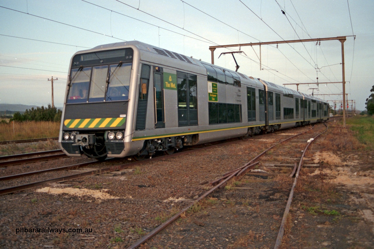 129-1-03
Nar Nar Goon, 4D (Double Deck Development and Demonstration), double deck suburban electric set, testing phase. The set was built by Goninan NSW in December 1991 as a 'Tamgara' model.
Keywords: 4D;Double-Deck-Development-Demonstration-train;Goninan-NSW;Tangara;