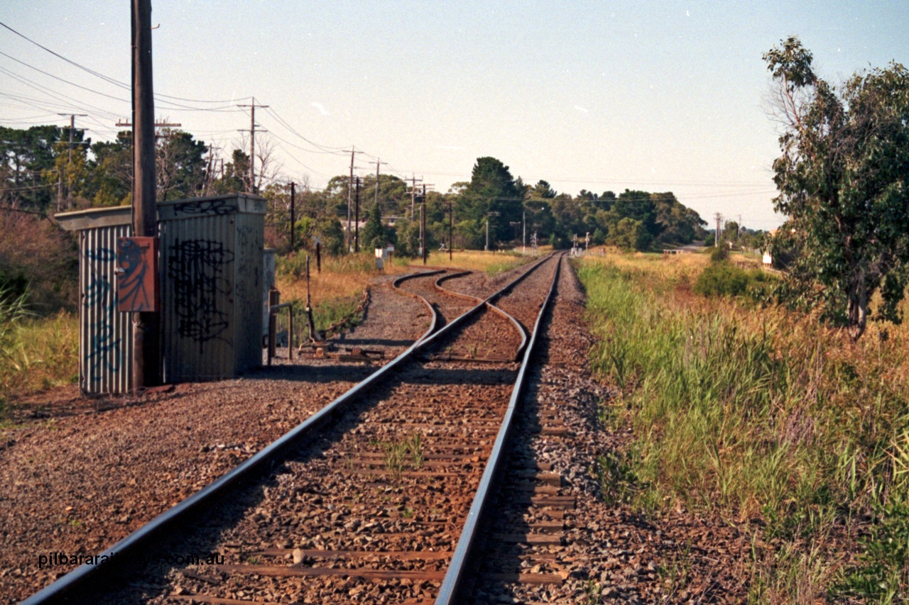 129-1-24
Long Island Junction track view, looking east, staff exchange hut, points and point lever.
