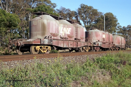 129-1-11
Lyndhurst, V/Line broad gauge VPCX type bogie air discharge cement hopper waggons VPCX 158, shows two styles of roof platforms. VPCX 158 is the final member of a batch of fifty (109-158) built at Bendigo Workshops in 1981/82. Re-classed in 1996 to VPBX. Location is [url=https://goo.gl/maps/APmJrHjskZH4gvxa6]Geo Data[/url].
Keywords: VPCX-type;VPCX158;VPBX-type;