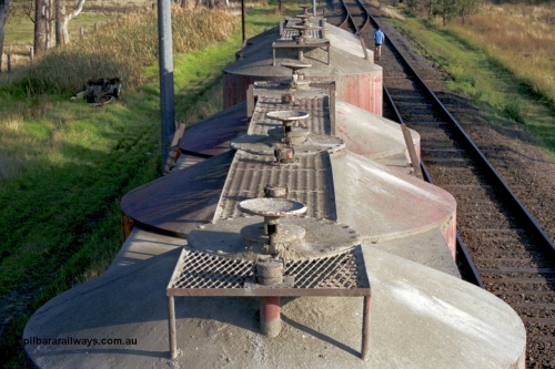 129-1-12
Lyndhurst, detail roof view of V/Line broad gauge VPCX type bogie cement waggons. Location is [url=https://goo.gl/maps/APmJrHjskZH4gvxa6]Geo Data[/url].
Keywords: VPCX-type;