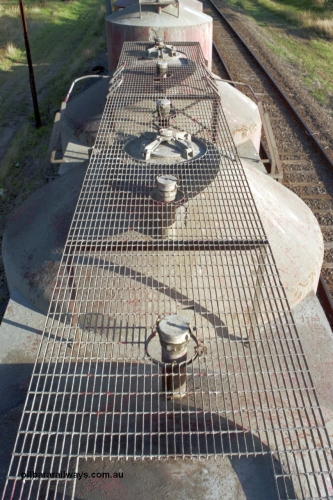 129-1-13
Lyndhurst, detail roof view of V/Line broad gauge VPCX type bogie cement waggons, shows wider and higher rectangular style grid mesh. Location is [url=https://goo.gl/maps/APmJrHjskZH4gvxa6]Geo Data[/url].
Keywords: VPCX-type;