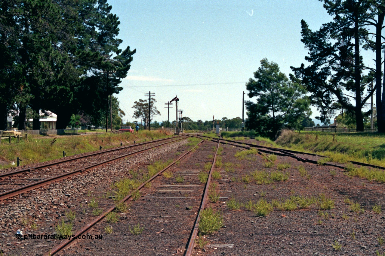 129-2-06
Lang Lang yard overview, looking towards Melbourne up direction, up home departure semaphore signal, track removed.
