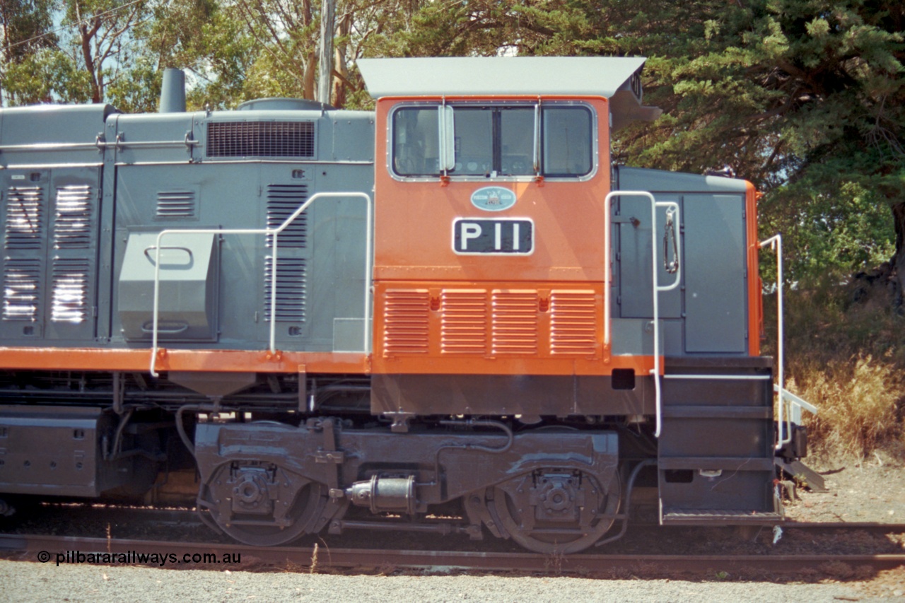 129-2-27
Leongatha V/Line P class P 11 Clyde Engineering EMD model G18HBR serial 84-1205 rebuilt from T 336 Clyde Engineering EMD model G8B serial 56-110, stabled pass, RHS cab side shot.
Keywords: P-class;P11;Clyde-Engineering-Somerton-Victoria;EMD;G18HBR;84-1205;rebuild;