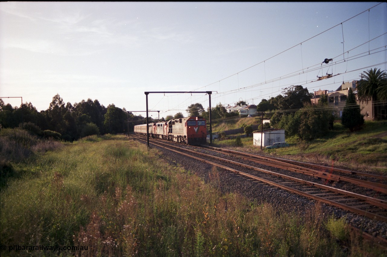 129-3-17
Warragul broad gauge V/Line down pass N class N 453 'City of Albury' Clyde Engineering EMD model JT22HC-2 serial 85-1221, A classes A 62 Clyde Engineering EMD model AAT22C-2R serial 84-1183 rebuilt from B 62 Clyde Engineering EMD model ML2 serial ML2-3 and A 66 serial 84-1186 rebuilt from B 66 serial ML2-7, N set N 12.
Keywords: N-class;N453;Clyde-Engineering-Somerton-Victoria;EMD;JT22HC-2;85-1221;