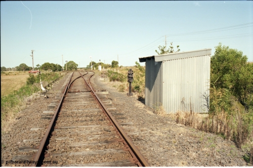129-3-12
Barry Beach Junction track overview, junction points, Welshpool - Yarram line is main, line to Barry Beach and ESSO complex on the right, redundant staff lock opposite points and lever.
