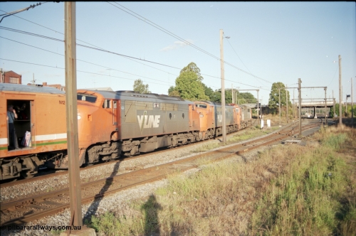 129-3-19
Warragul broad gauge V/Line down pass N class N 453 'City of Albury' Clyde Engineering EMD model JT22HC-2 serial 85-1221, A classes A 62 Clyde Engineering EMD model AAT22C-2R serial 84-1183 rebuilt from B 62 Clyde Engineering EMD model ML2 serial ML2-3 and A 66 serial 84-1186 serial ML2-7, N set , trailing shot.
Keywords: N-class;N453;Clyde-Engineering-Somerton-Victoria;EMD;JT22HC-2;85-1221;