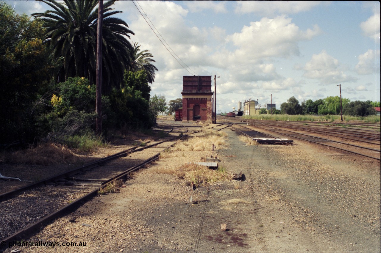 131-1-05
Echuca yard overview, looking south from dock area of station, water tower, track view.
