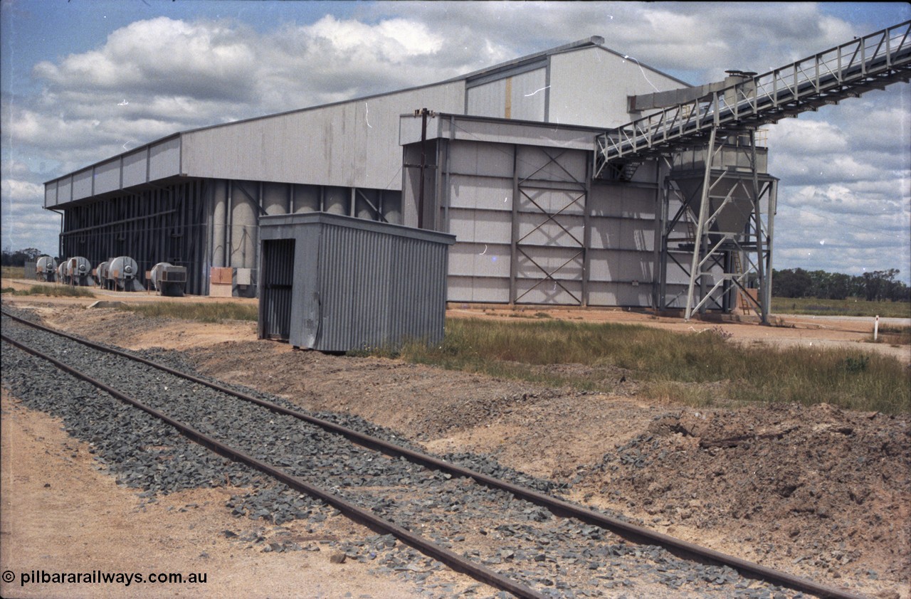 131-2-02
Burraboi rice storage complex, looking south from middle of yard, Mallee style staff shed.
