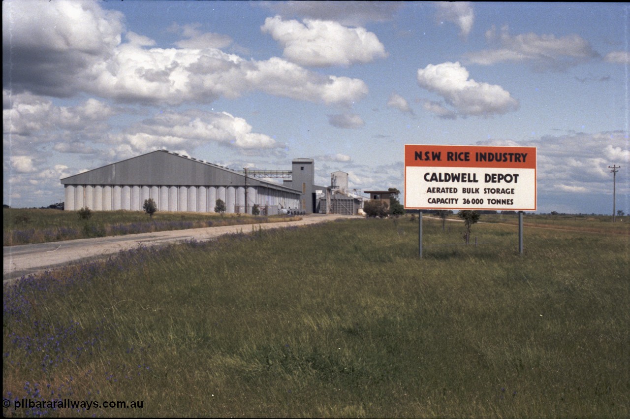 131-2-11
Caldwell rice storage complex and sign.
