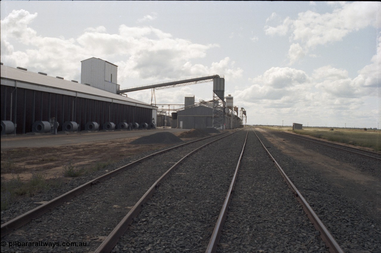 131-2-13
Caldwell rice storage complex, track view, Mallee style staff hut.
