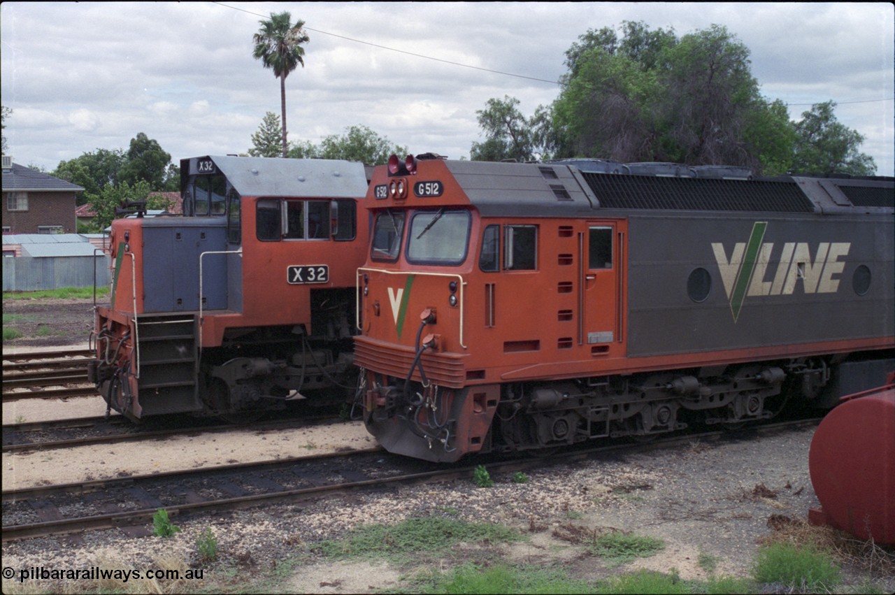 132-26
Mildura loco depot V/Line broad gauge X class X 32 Clyde Engineering EMD model G16C serial 66-485 and G class G 512 Clyde Engineering EMD model JT26C-2SS serial 84-1240, cab side view.
Keywords: G-class;G512;Clyde-Engineering-Rosewater-SA;EMD;JT26C-2SS;84-1240;X-class;X32;G16C;66-485;