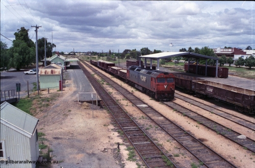 132-03
Ouyen station overview, broad gauge V/Line G class G 540 Clyde Engineering EMD model JT26C-2SS serial 89-1273 with stabled up gypsum train 9138, looking south from footbridge, station building and platform, Freightgate canopy with grounded waggons.
Keywords: G-class;G540;Clyde-Engineering-Somerton-Victoria;EMD;JT26C-2SS;89-1273;