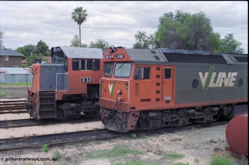 132-25
Mildura loco depot V/Line broad gauge X class X 32 Clyde Engineering EMD model G16C serial 66-485 and G class G 512 Clyde Engineering EMD model JT26C-2SS serial 84-1240, cab side view.
Keywords: G-class;G512;Clyde-Engineering-Rosewater-SA;EMD;JT26C-2SS;84-1240;X-class;X32;G16C;66-485;