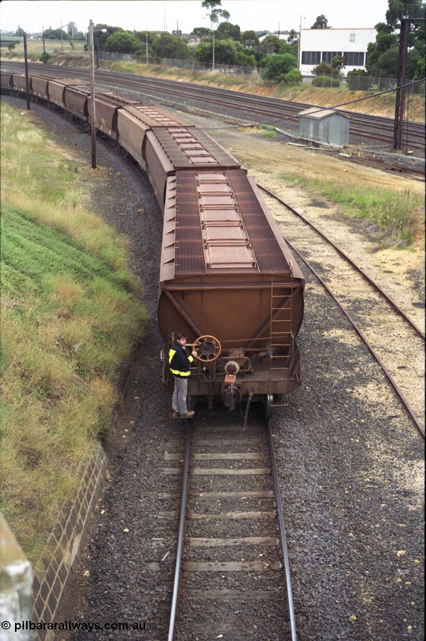 133-11
North Geelong grain loop, shunter on rear grain waggon, Melbourne - Geelong lines at right of image.
