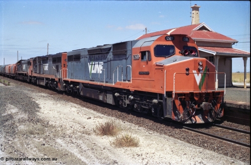 133-24
Gheringhap, V/Line broad gauge locos C class leader C 501 'George Brown' Clyde Engineering EMD model GT26C serial 76-824 leads C 506 serial 76-829 and X class X 45 'Edgar H Brownbill' Clyde Engineering EMD model G26C serial 75-792 with train 9169 down Adelaide goods, pausing for safeworking purposes.
Keywords: C-class;C501;Clyde-Engineering-Rosewater-SA;EMD;GT26C;76-824;