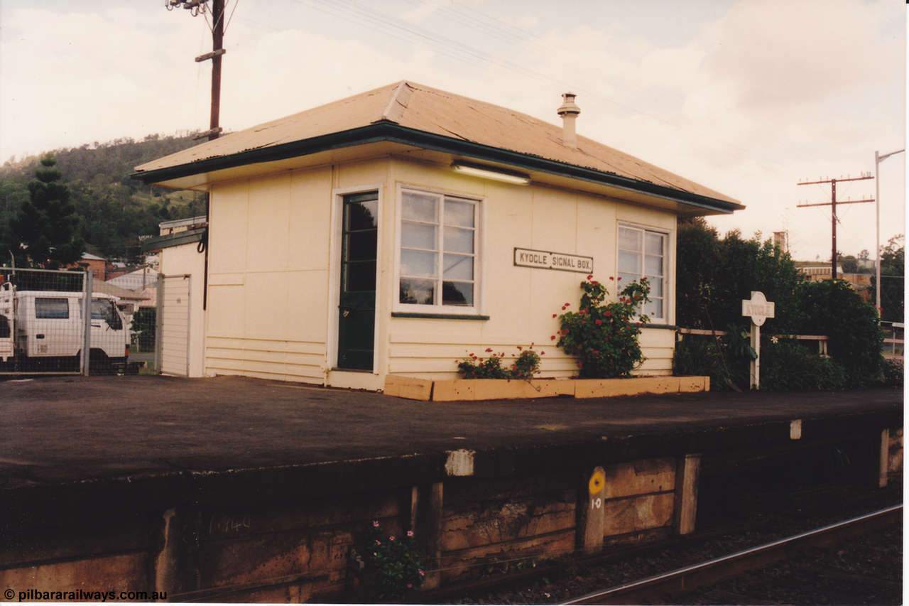 134-19
Kyogle, signal box, track view, platform, station sign.
