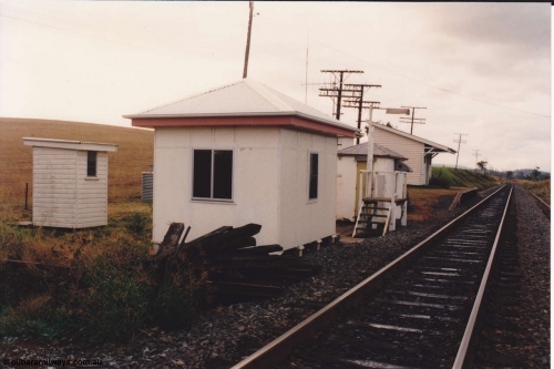 134-32
Tamrookum, station overview, staff exchange platform, WC, interlocking room, waiting room and platform, looking north.
