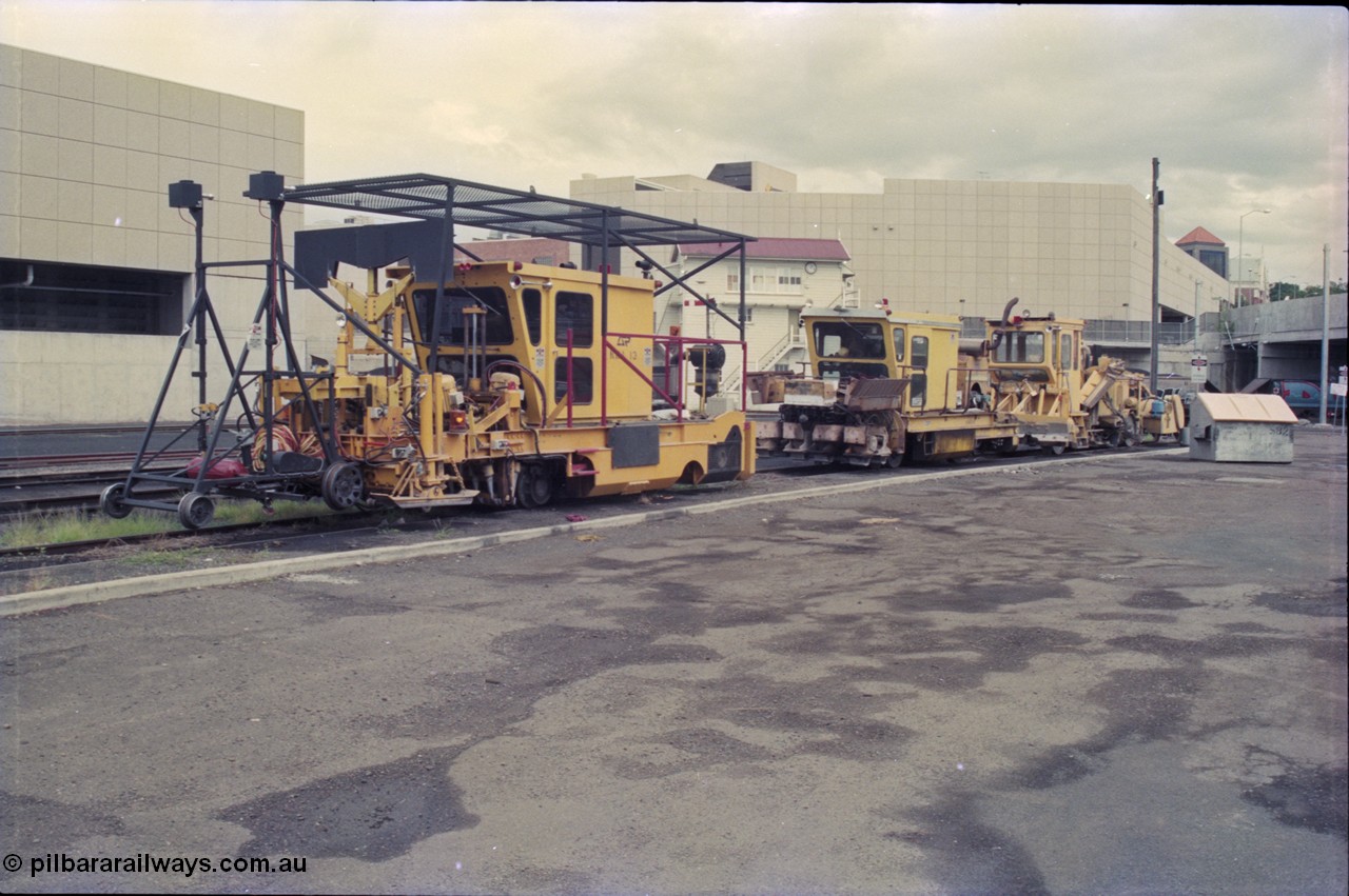 135-09
Ipswich yard, narrow gauge track machines.
Front unit is a Canron Mk I switch tamper, second unit is a Tamper Crib & Shoulder Compactor and the third unit is a Harsco ballast regulator.
