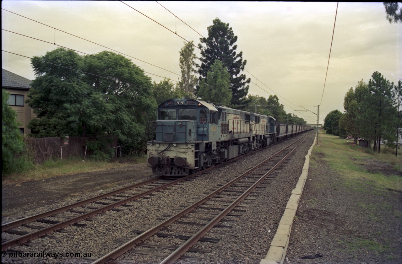 135-12
2400 class QR locos 2503 and 2500 with a loaded coal train, near Ipswich.
