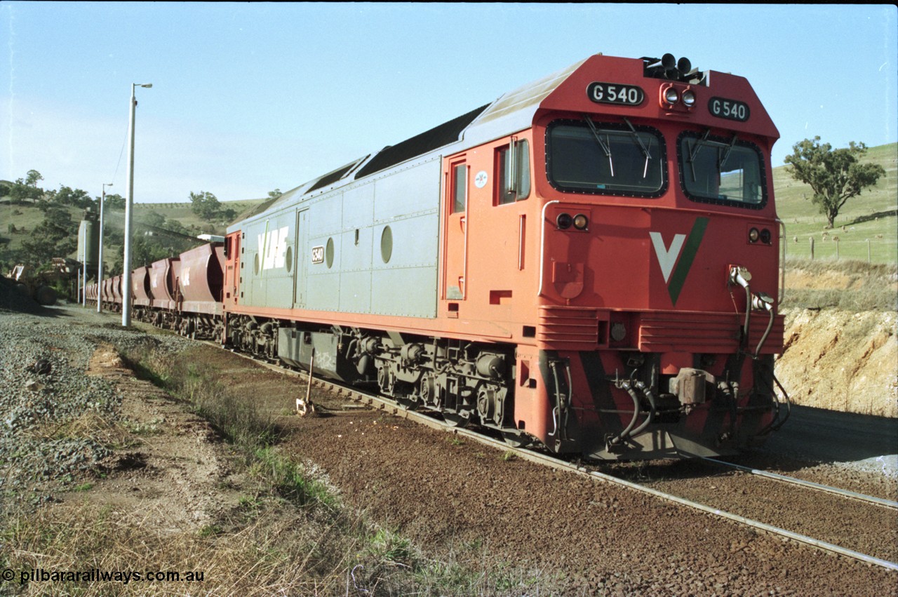 135-20
Kilmore East Apex Quarry siding, V/Line broad gauge G class G 540 Clyde Engineering EMD model JT26C-2SS serial 89-1273 on the front of the stone train as it is loaded by the front-end wheel loader.
Keywords: G-class;G540;Clyde-Engineering-Somerton-Victoria;EMD;JT26C-2SS;89-1273;