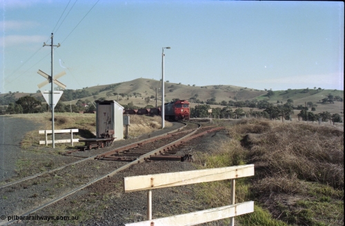135-13
Kilmore East Apex Quarry siding, V/Line broad gauge G class G 540 Clyde Engineering EMD model JT26C-2SS serial 89-1273 arriving with the empty train 9315, points, telephone cabin, point lever.
Keywords: G-class;G540;Clyde-Engineering-Somerton-Victoria;EMD;JT26C-2SS;89-1273;