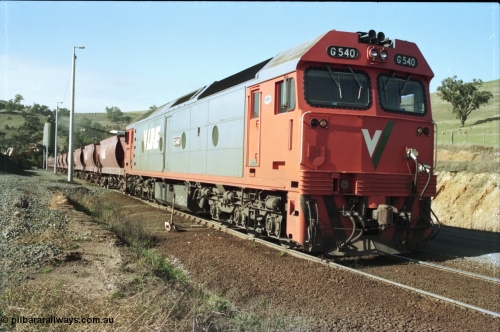 135-20
Kilmore East Apex Quarry siding, V/Line broad gauge G class G 540 Clyde Engineering EMD model JT26C-2SS serial 89-1273 on the front of the stone train as it is loaded by the front-end wheel loader.
Keywords: G-class;G540;Clyde-Engineering-Somerton-Victoria;EMD;JT26C-2SS;89-1273;