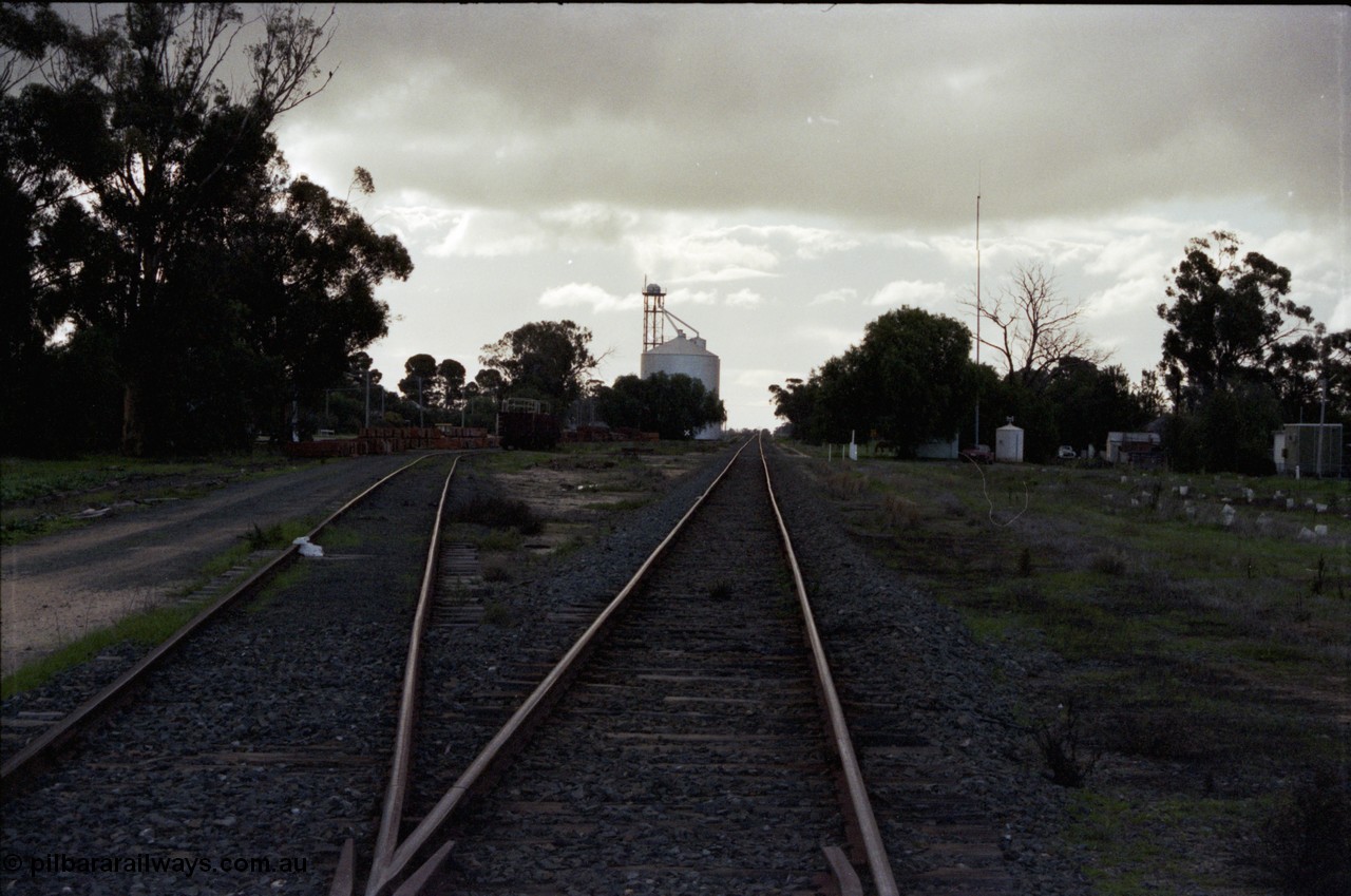 136-01
Mathoura station yard overview looking north, sleeper loading site on the left, Ascom style silo complex, station building and radio repeater tank on the right.
