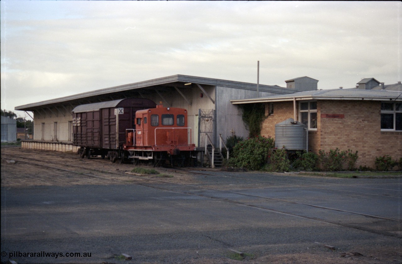 136-12
Deniliquin station overview, station building and goods shed, V/Line broad gauge rail tractor RT class RT 50, originally an I class waggon I 7457 built in 1905, finally converted from IA class waggon 7457 by Ballarat North Workshops to RT in September 1969, and VLCX class bogie louvre van.
Keywords: RT-class;RT50;Victorian-Railways-Ballarat-Nth-WS;I-type;I7457;IA-type;IA7457;VLCX-type;